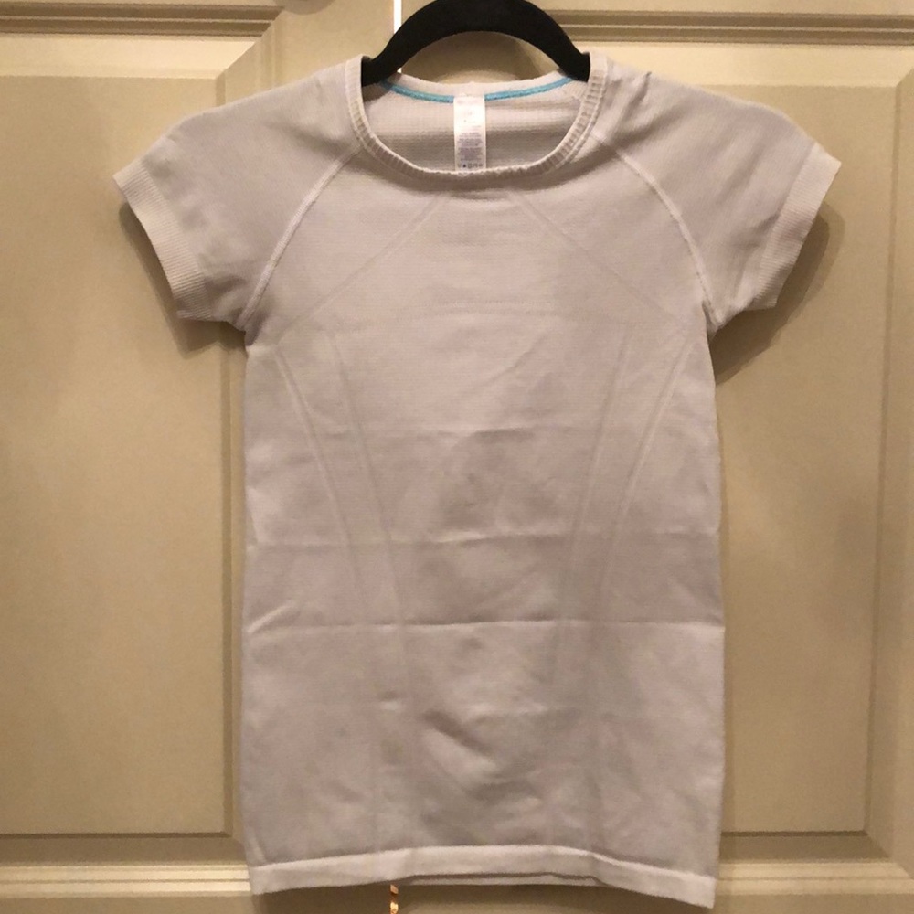 white ivivva form fitting tee